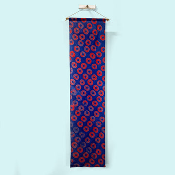 Deep Blue Wall Hanging with Red Donuts